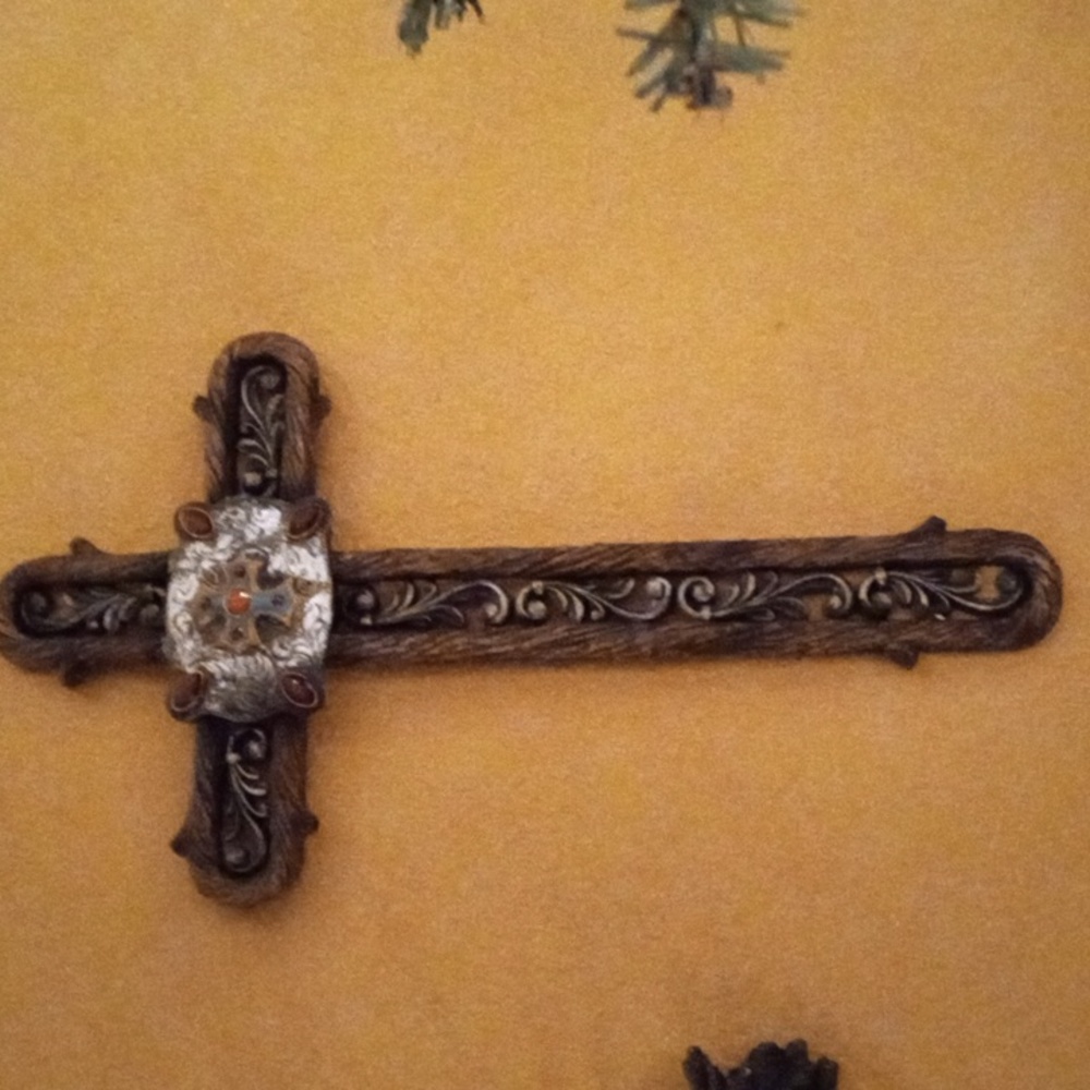 Very unique heavy duty beaded cross with jewels in it paid $275 will take $200